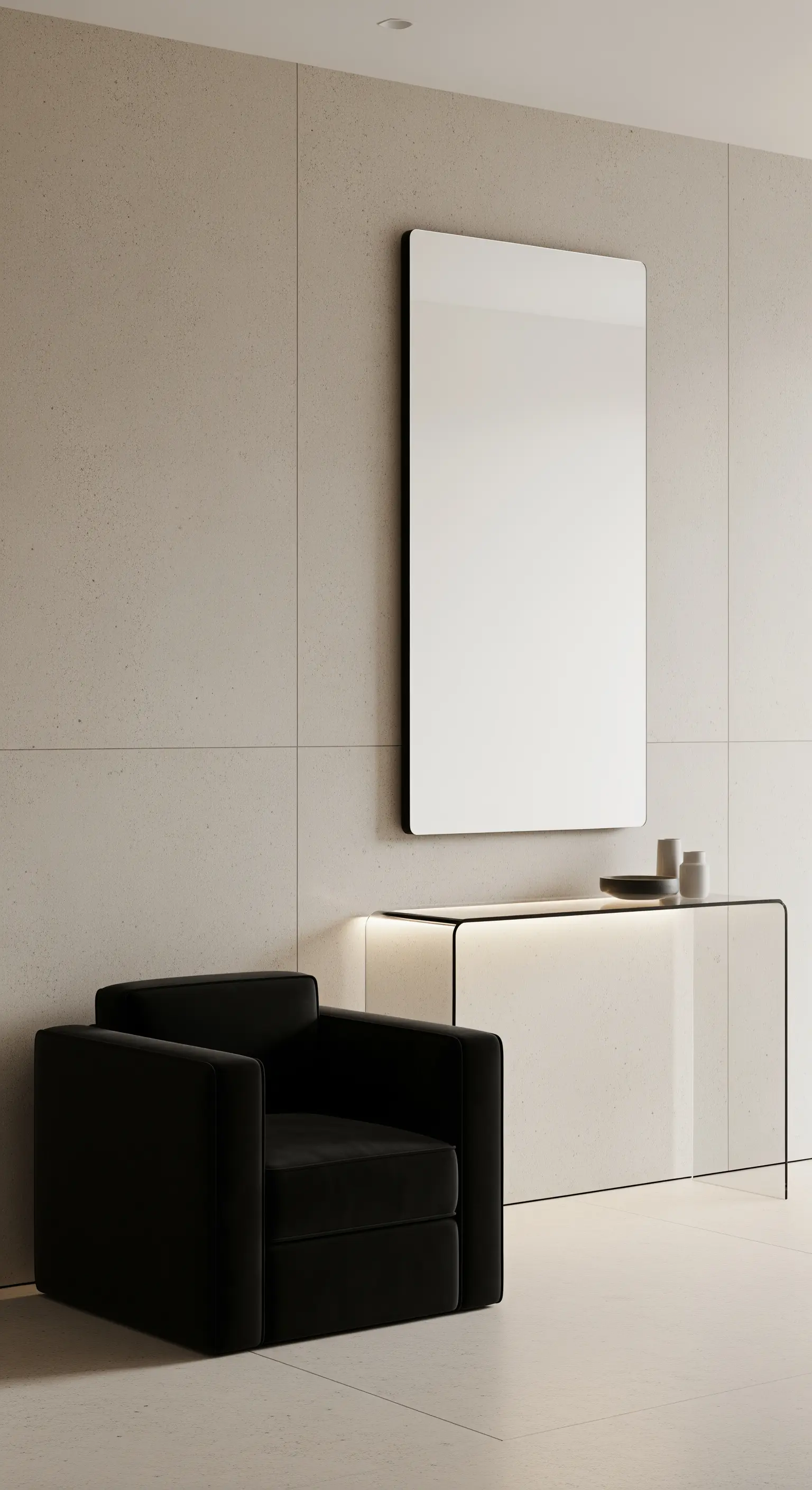Ingresso minimalista con specchio verticale, consolle con base luminosa e poltrona nera