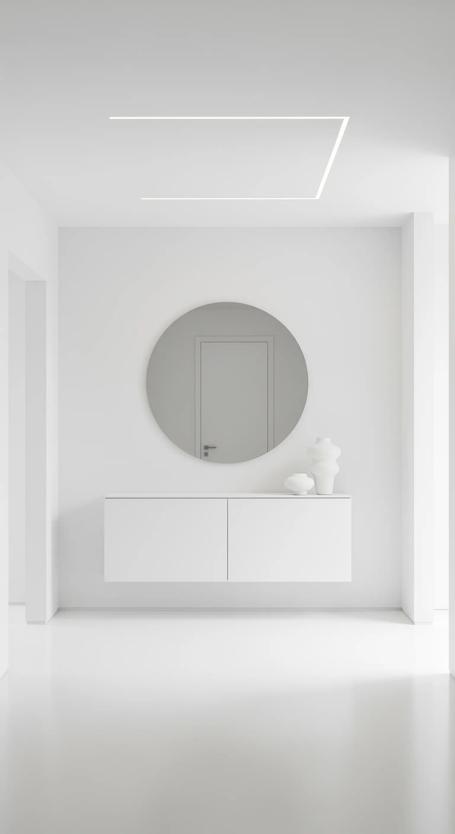 Ingresso total white con consolle sospesa, specchio rotondo e illuminazione a LED integrata.