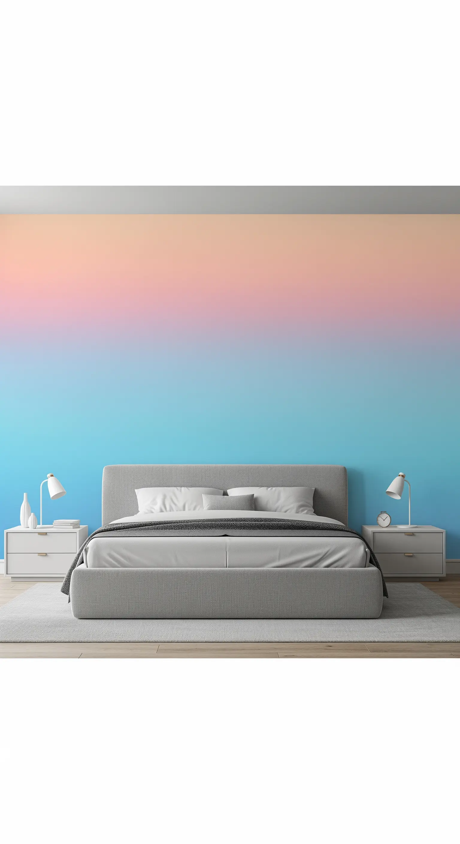 Parete con effetto sfumato dal rosa al blu dietro un letto grigio.