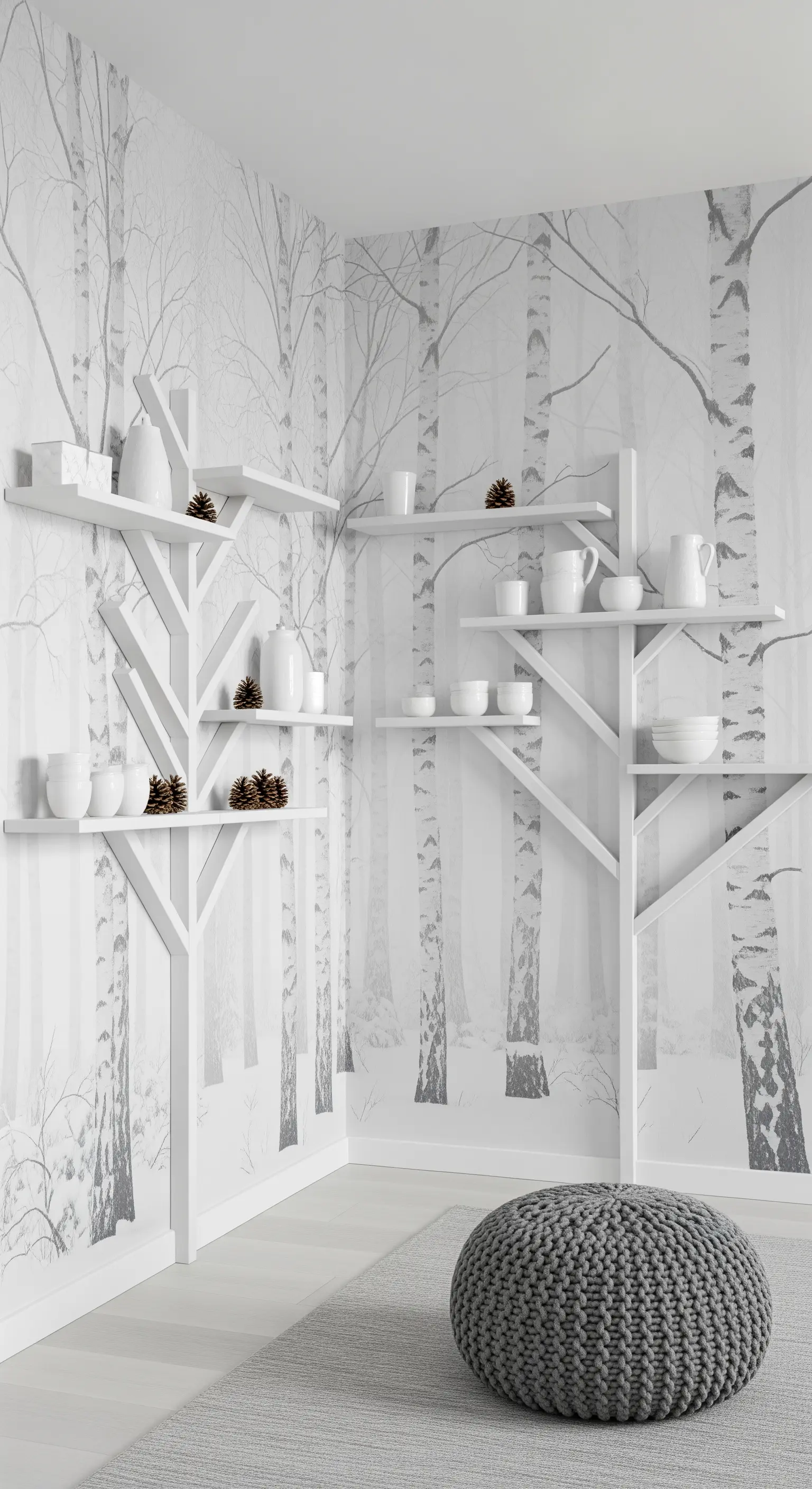 Mensole bianche a forma di rami su un murale che raffigura una foresta di betulle in inverno.