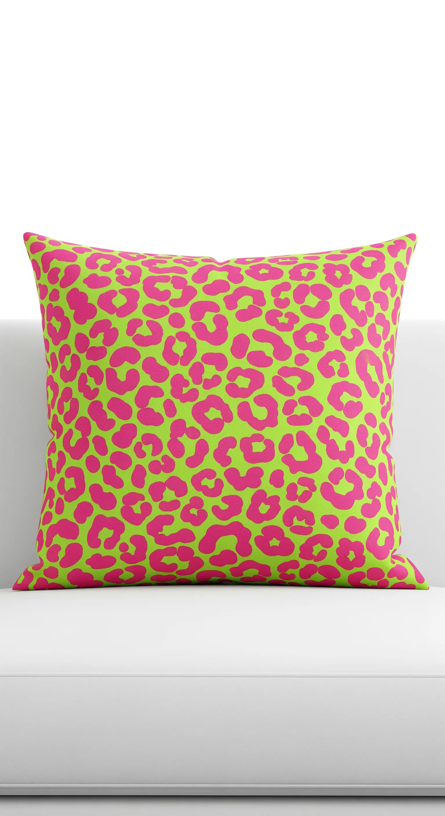 Cuscino con stampa leopardata in rosa shocking su uno sfondo verde acido.