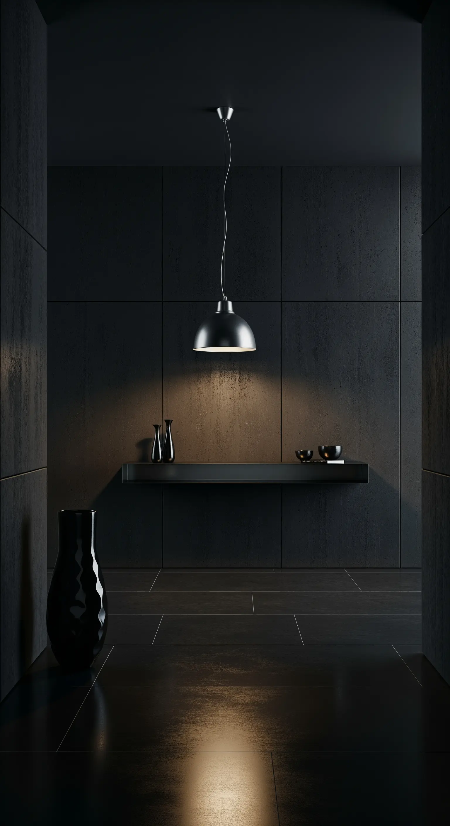 Ingresso total black con pareti a pannelli, consolle sospesa e una singola lampada a sospensione.