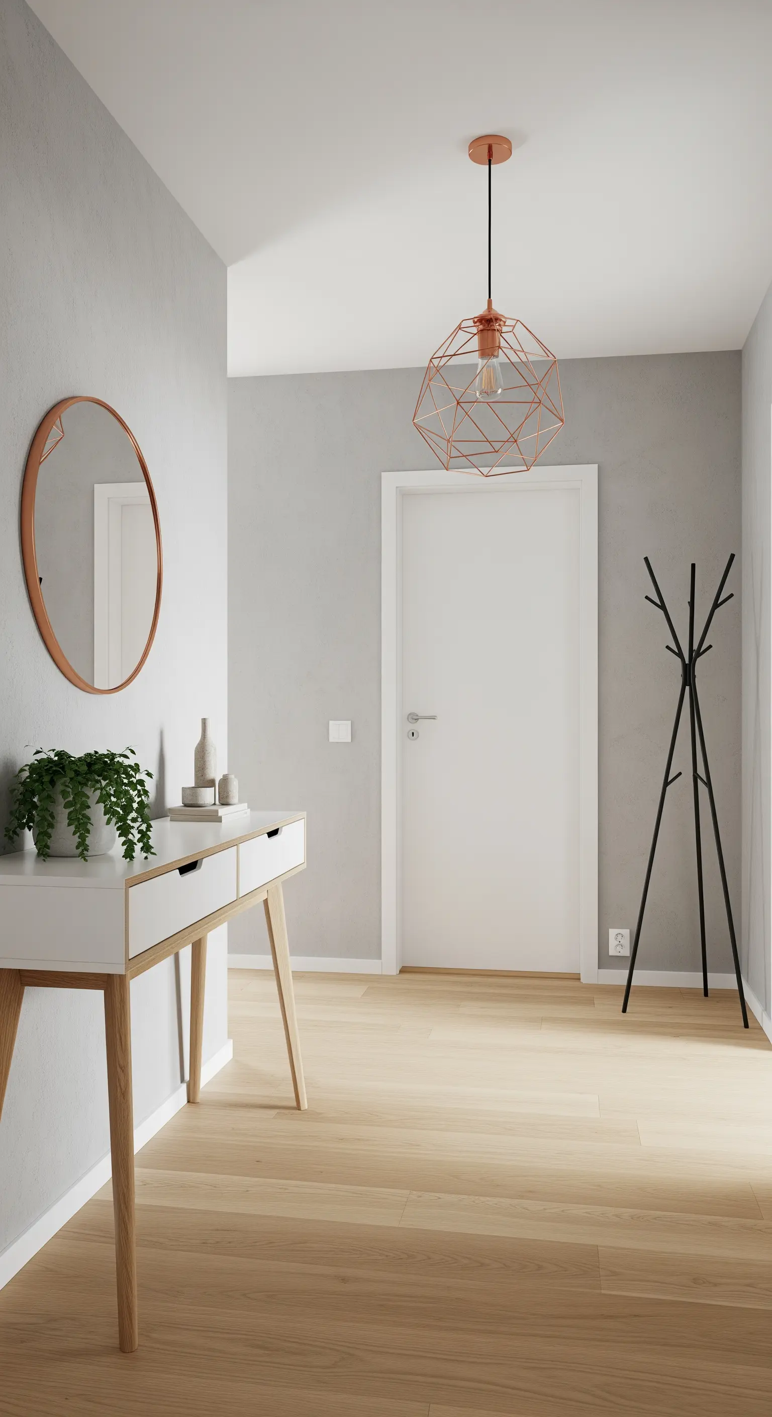 Ingresso in stile scandinavo con parete grigio chiaro, consolle bianca e dettagli in rame.
