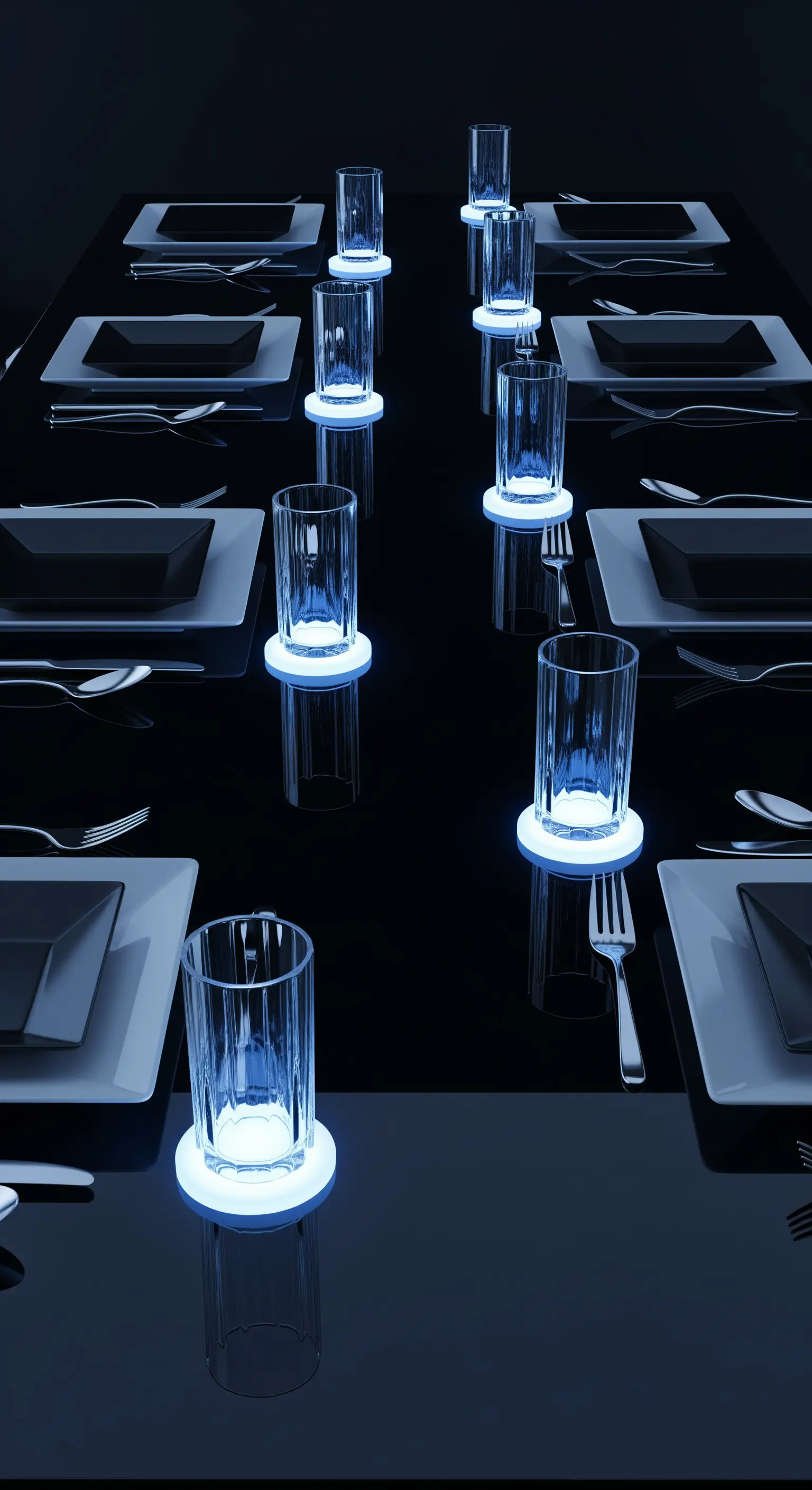 Tavola minimalista con sottobicchieri a LED che illuminano i bicchieri dal basso.